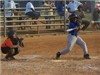 Boy Swinging at a Ball